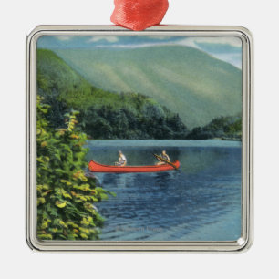 Paare, die auf einem See Canoeing sind Silbernes Ornament