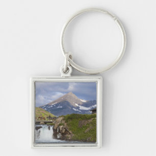 Packer führen Pferde über Brücke über Brücke Schlüsselanhänger