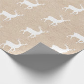 Packpapier-Blick und weißer Rotwild-Hirsch mit den Geschenkpapier (Ecke)