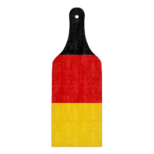 Paddel aus Glas mit der Flagge Deutschlands Schneidebrett