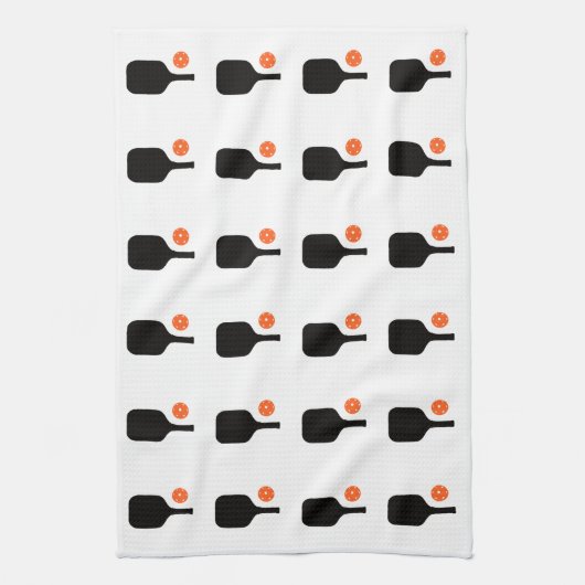 Paddel aus schwarzem Pickleball und Handtuch aus o (Vertikal)