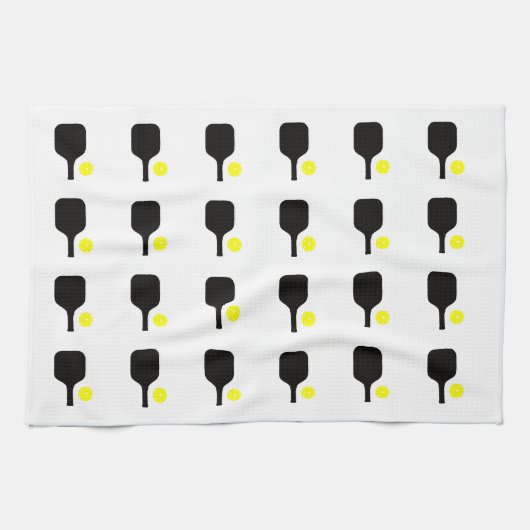 Paddel und gelbe Bälle aus schwarzem Pickleball Geschirrtuch (Horizontal)