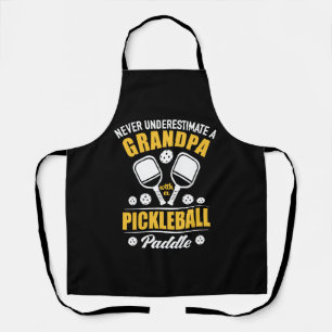 Paddleball - Opa mit Pickleball-Paddel Schürze