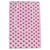 Padrão fofo de pequenos corações. mittlere geschenktüte (Vorderseite)