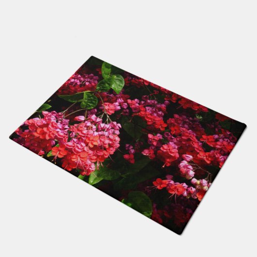 Pagode Blume farbenfroh rot und rosa Fußmatte (Schrägansicht)