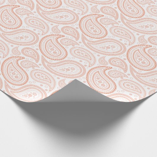 Paisley-Leuchtorange auf weißem Packpapier (Ecke)