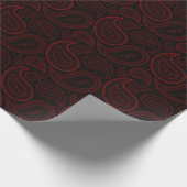 Paisley-Rot auf schwarzem Packpapier (Ecke)