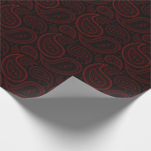 Paisley-Rot auf schwarzem Packpapier