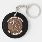 Paläontologe in Ausbildung von Dinosaurier Fossil Schlüsselanhänger (Rückseite)