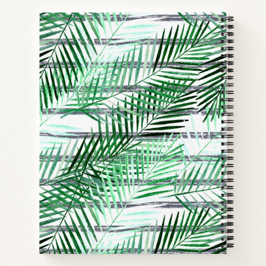 Palm Blätter auf einem schwarz-weiß gestreiften Hi Notizblock (Rückseite)