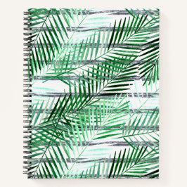 Palm Blätter auf einem schwarz-weiß gestreiften Hi Notizblock