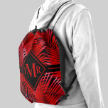 Palm Tree Pattern Red Black Monogram Sportbeutel<br><div class="desc">Red tropical palm fronds on a black background ready for your monogram in chic lettering on the front in any color (can be deleted or moved on the layout.) Create for yourself or give as a gift.</div>