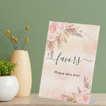 Pampas Gras Blush Rose Blumengeweih Zeichen Sockelschild<br><div class="desc">Ein rustikal rot rosa,  Rose goldener Farbverlauf Hintergrund. Die Einrichtung ist mit Rose-Gold und rosa Blumen,  Rose und Pampas-Gras dekoriert. Mit dem Text: Favoriten,  bitte nehmen Sie einen!</div>