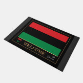 Pan African Flag House matt & Unia Symbol / Willko Fußmatte (Schrägansicht)