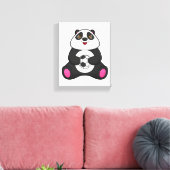 Panda als Fußballspieler mit Fußball Leinwanddruck (Insitu (Wohnzimmer))