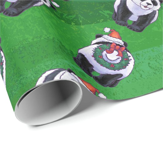 Panda Bear in Weihnachtsmannmütze auf Green Geschenkpapier (Rolleneckpunkt)