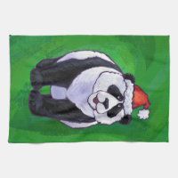Panda Bear in Weihnachtsmannmütze auf Green