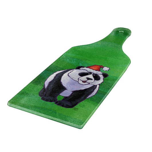 Panda Bear in Weihnachtsmannmütze auf Green Schneidebrett (Ecke)