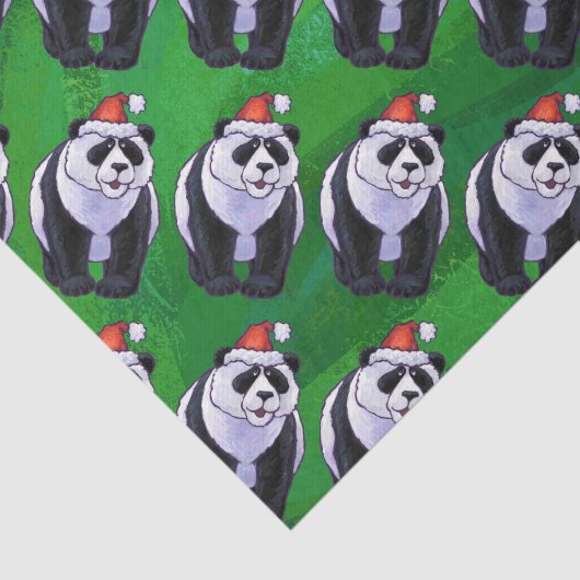 Panda Bear in Weihnachtsmannmütze auf Green Seidenpapier (Ausschnitt)