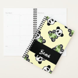 Panda bear with green bamboo leaves planer