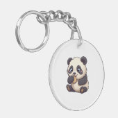 Panda isst einen Keks Schlüsselanhänger (Vorderseite links)