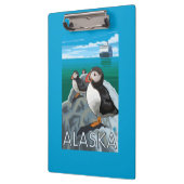 Papageientaucher, die ein Kreuzschiff aufpassen Klemmbrett (Links)