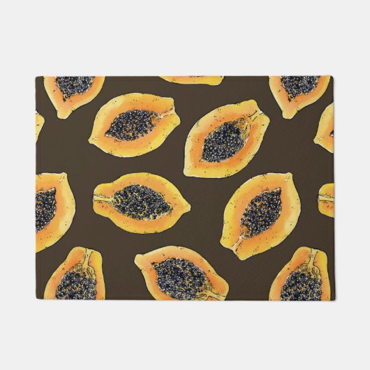 Papaya-Scheiben auf dunkelbraun Fußmatte (Vorderseite)