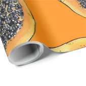Papaya-Scheiben auf Orange Geschenkpapier (Rolleneckpunkt)
