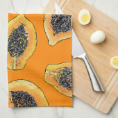 Papaya-Scheiben auf Orange Geschirrtuch (Viertel Falte)