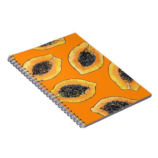 Papaya-Scheiben auf Orange Notizblock (Rechte Seite)