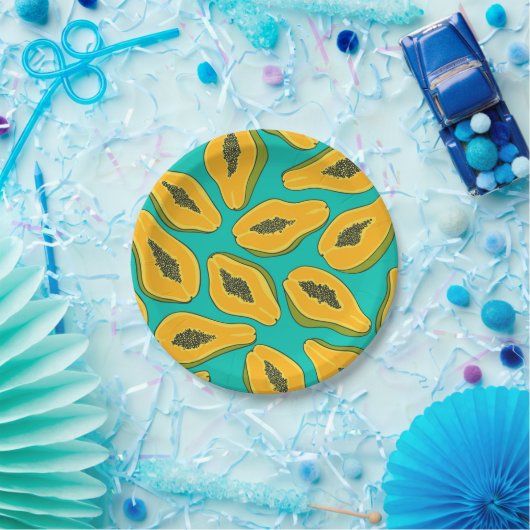 Papaya-Scheiben auf Türkis Pappteller (Party)