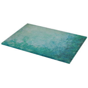 Papier mit der blauen, grünen und schwarzen Farbe Schneidebrett