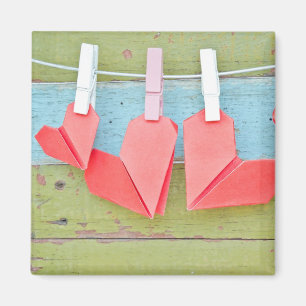 Papierherz, das an der Wäscheleine hängt Magnet