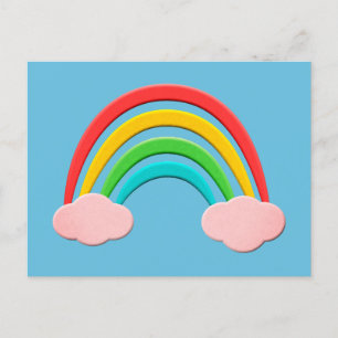 Papierschnitt Regenbogen und rosa Wolken Postkarte