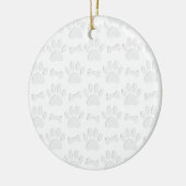 Papierschnitt von Hundeschleifen und Knochenmuster Keramikornament (Links)