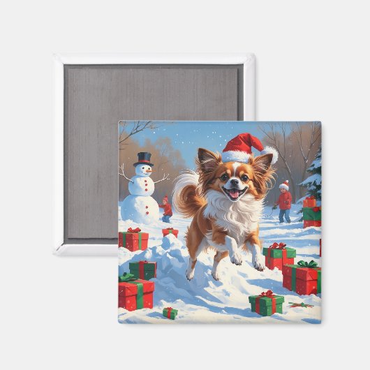 Papillon Hund läuft im Schnee mit Weihnachtshut Magnet (Vorderseite/Rückseite)