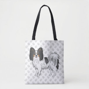 Papillon-Hund mit dreifarbigem Cartoon-Muster und Tasche