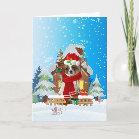 Papillon in snow with Christmas gifts Karte (Vorderseite)