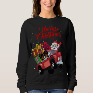 Papillon mit dem Weihnachtsmann im roten Lkw-Hund Sweatshirt
