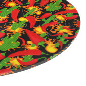 Paprikaschoten mit rotem Chili Schneidebrett (Ecke)