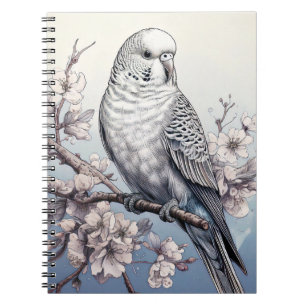 Parakeet in weichem blauem Notebook Notizblock