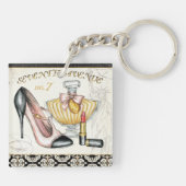 Parfüm, roter Lippenstift und ein Hoch auf den Schlüsselanhänger (Rückseite)