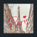Paris Magnet<br><div class="desc">Dieser elegante und stilvolle Magnet zeigt ein Aquarellbild des berühmten Eiffelturms, das durch eine Seitenstraße zu sehen ist - und erinnert an Erinnerungen von Pariser Reisen und das französische Straßenleben! Das Wort "Paris" in leuchtend rot mit einem Herz fügt eine stilvolle und moderne Touch hinzu - Sie können diesen Text...</div>