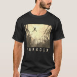 Parkhotel Delta Wellbeing Resort T-Shirt<br><div class="desc">Der Eindruck eines modernen Künstlers,  in einer urbanen Hinterstraße in Sepia-Tönen Parkour zu praktizieren.</div>