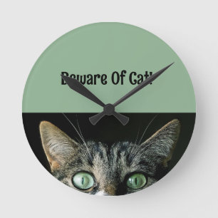 Passen Sie auf die Uhr der Katzenwand auf