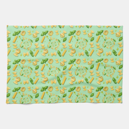 Pasta and basil leaves on green geschirrtuch (Horizontal)