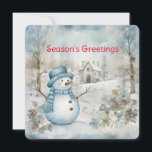 Pastel Blue Snowman und alte Kirchenwinterszene Feiertagskarte<br><div class="desc">Ein zartes Pastellblau übertrifft die Winterwaldszene mit einem Schneemann und einer alten Kirche in dieser Weihnachtskarte,  die "Weihnachtsgrüße" sendet. Personalisiert auf der Rückseite mit Ihrem Namen ein geeigneter Vers für die Ferien.</div>