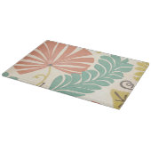 Pastelblumenreben und Blätter auf Cremeuntergrund Schneidebrett (Ecke)