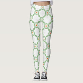 Pastellgrüne und orangefarbene Blumenblatt-Muster- Leggings