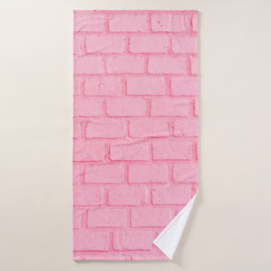 Pastellrosa Backsteinstruktur. rosa Badehandtuch